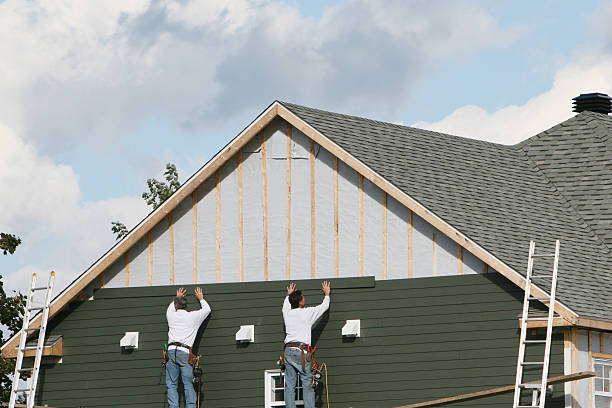 Professional Siding technician working in Avondale, PA